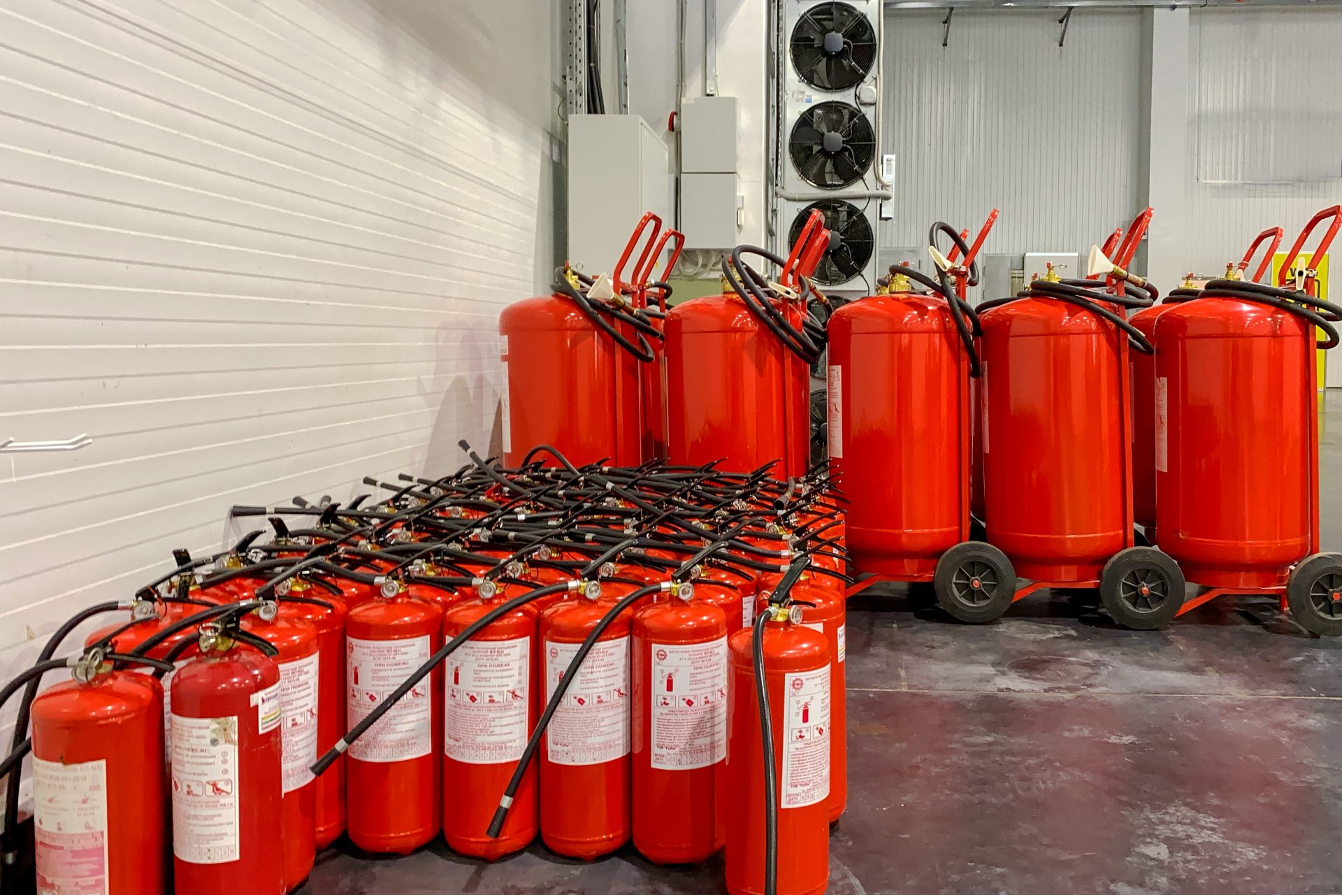 Explaining the distinctions between fire suppression systems and fire extinguishers